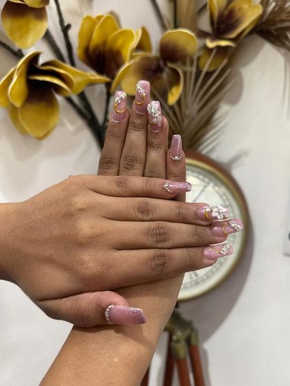 A complete look at this breathtaking bridal nail set. We work with each bride to create a custom design that perfectly complements her style and wedding theme.