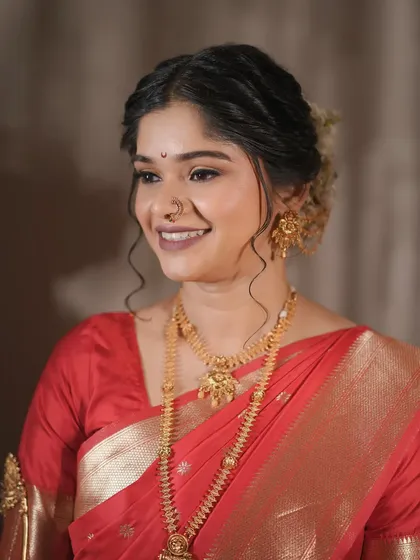 A close-up portrait of the bride. Her soft, wavy hair and glowing makeup create a look that is both modern and timeless.