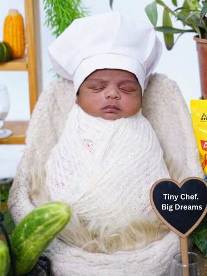 Another adorable shot of the tiny chef with a sign that says "Big Dreams." These themed shoots are all about telling a story.