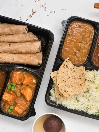 We offer a variety of meal combinations to suit your preference. Here you can see our paneer matar curry and phulka combo alongside a classic dal, sabzi, and rice meal.