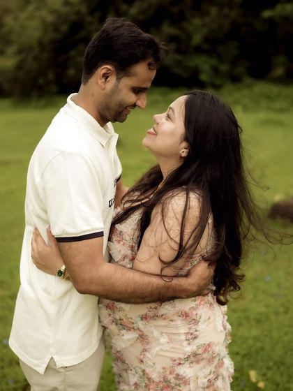A close-up of the couple embracing, filled with love and laughter. This shot focuses purely on their emotional connection.
