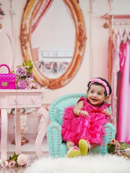 Another adorable shot from the pink closet theme, capturing a moment of pure happiness.