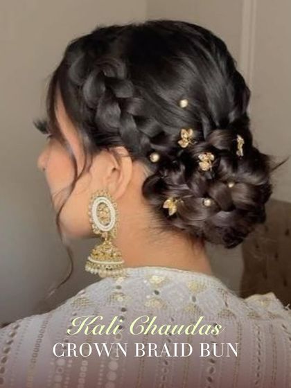 A crown braid bun is a beautiful and traditional choice for Kali Chaudas. This intricate updo keeps hair neatly off the face and looks stunning with traditional Indian earrings.