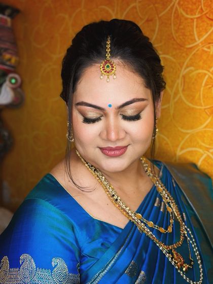 An eyes-closed shot to highlight the soft, shimmery eyeshadow.