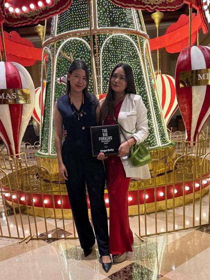 Two of our team members celebrating with the award. This is for our entire Naga Belly family.