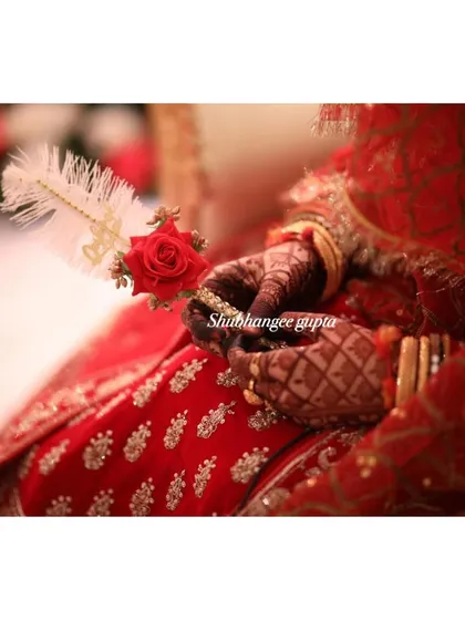 A close-up of the back-of-hand stain, looking so elegant with the bride's wedding accessories. The rich color is the perfect finishing touch.