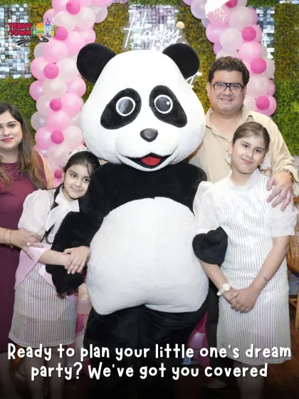 Ready to plan your little one's dream party? This photo with the panda mascot shows we've got you covered.