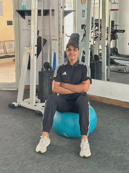 Demonstrating stability and balance on the exercise ball.
