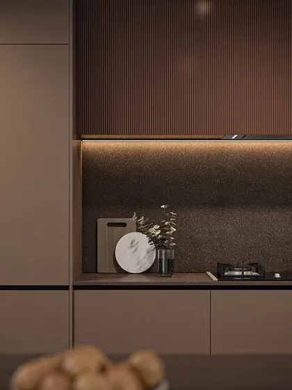 A closer look at the cooking zone, featuring an induction hob and backlit open shelving. This detail shows how I balance aesthetics with practicality, ensuring everyday items are both beautifully displayed and easily accessible.