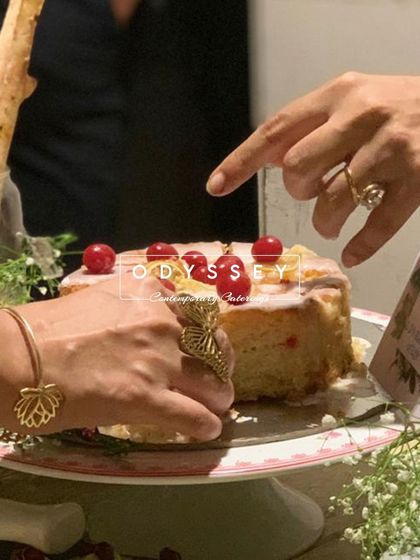 A heartwarming moment of guests enjoying a cake from our grazing table. Our setups are designed to bring people together and create special memories around delicious food.