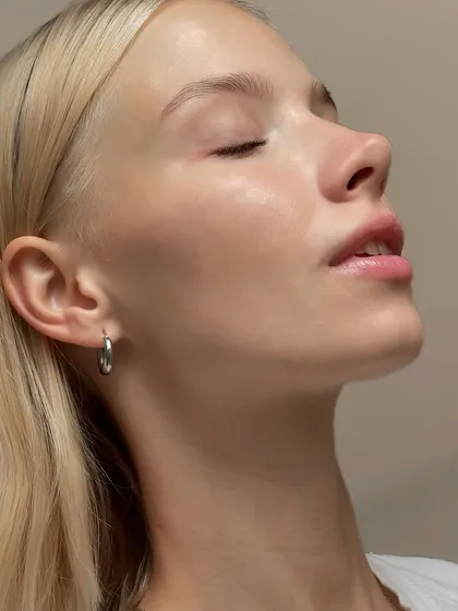 A side profile showing the beautiful, upward curve of the lashes after lamination. This service is perfect for achieving a natural yet noticeable enhancement.