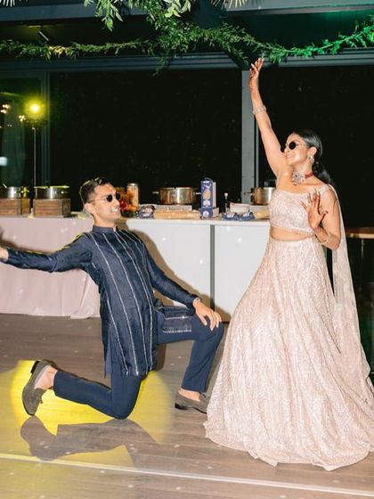 A fun, posed shot from the couple's performance in Italy. We make sure our virtual choreography includes these photo-worthy moments.