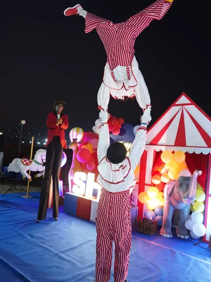 Our professional circus performers bring the magic of the big top to your event. This act features a duo of acrobats performing incredible feats of balance and strength, leaving guests of all ages in awe.