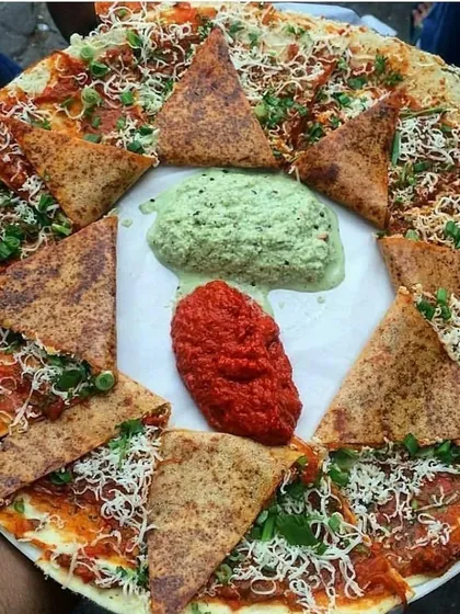 A platter of pizza dosa, an example of the fusion dishes I can create for a unique and memorable culinary experience.