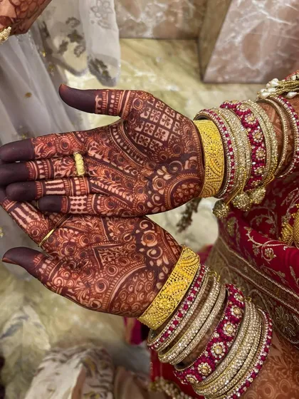 Here you can see the beautiful, deep red stain that develops from my all-natural, organic henna. This is the result 48 hours after application, perfectly complementing the bride's engagement jewelry and attire. A rich stain is my promise to every bride.