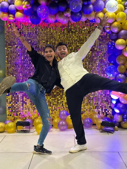 Capturing the high-kick energy and pure fun of our celebration with a team member.