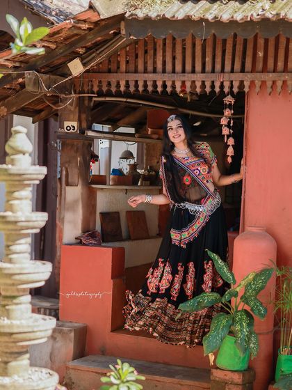 A vibrant and energetic series celebrating Navratri. The model is dressed in colorful Garba attire, and the photos capture the festive spirit through dynamic poses and joyful expressions.