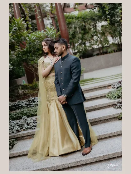 A romantic pose that showcases the bride's elegant side profile and the soft waves in her hair.