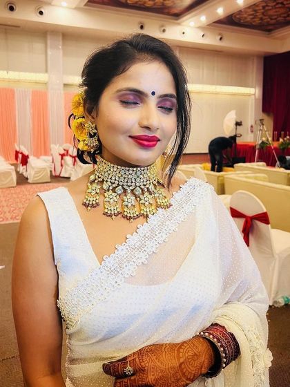 The complete look, showing how the makeup, hair, and outfit come together for a show-stopping reception appearance.