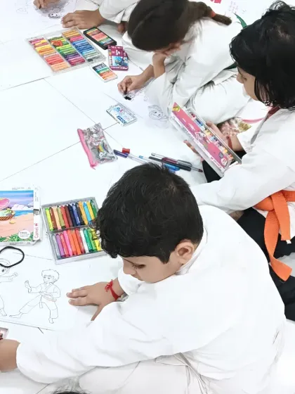 Look at the colorful supplies and the focused artists. It's a wonderful way to wind down and build friendships.