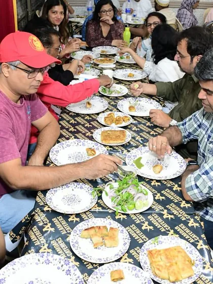 A family enjoying a variety of dishes from our menu.