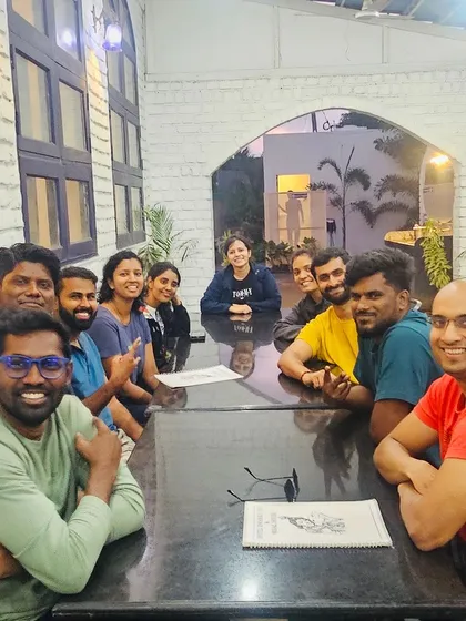 The group enjoying a meal together after a long day of trekking and exploring.