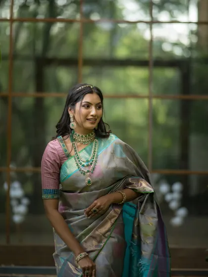 Another beautiful portrait, the soft focus on the background making the saree and the model the true stars.