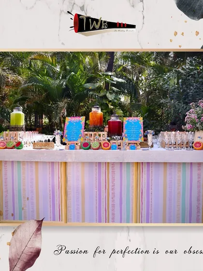 A wide view of our pastel-themed mocktail bar, perfect for a daytime celebration with its light and airy feel.