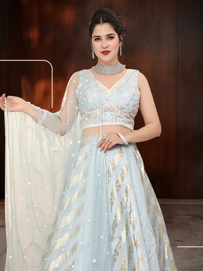 Another beautiful shot of the sky blue lehenga, perfect for making a statement at any special occasion.