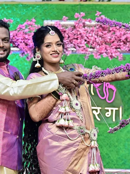 A joyful moment from a traditional Maharashtrian baby shower ceremony. The makeup is designed to be picture-perfect from every angle, ensuring the mom-to-be looks and feels her best throughout the event.