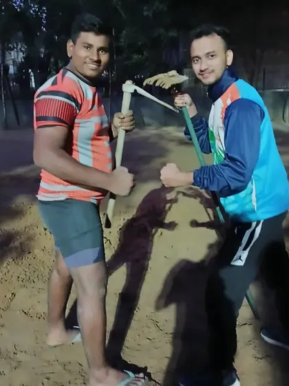 Posing with the tools after a hard day's work. This is the unseen effort that goes into making champions.