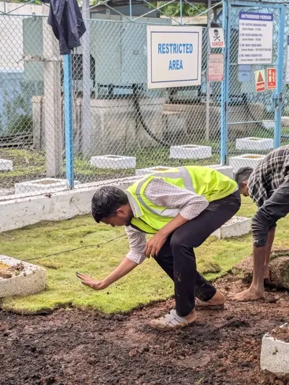 I am personally inspecting the newly laid grass near a restricted area on the industrial site. We ensure every corner of the project meets our quality standards.