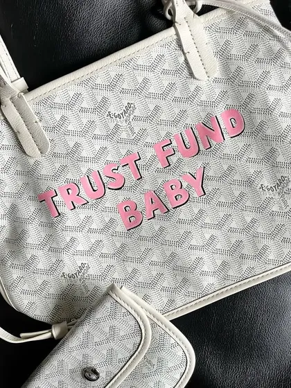 Another angle of the custom Goyard set. The lettering is painted with precision to match the brand's aesthetic.