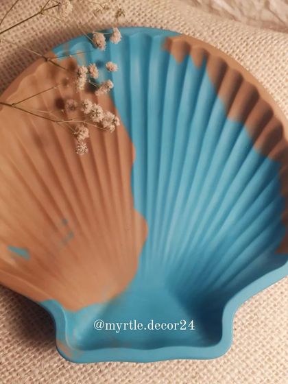 Another look at our two-tone clam shell dish, a perfect piece for anyone who loves the sea.