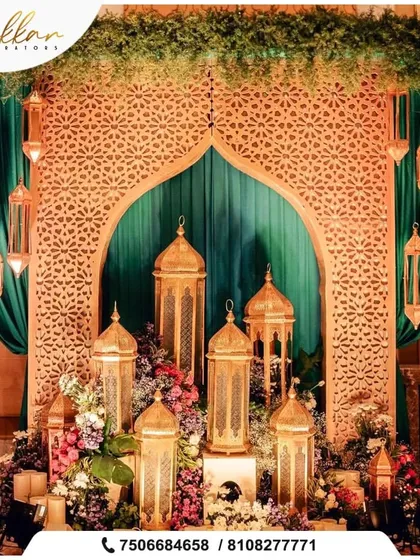 A beautiful Mughal-inspired decor setup, featuring intricate laser-cut panels and ornate golden lanterns, creating a rich and historical ambiance.