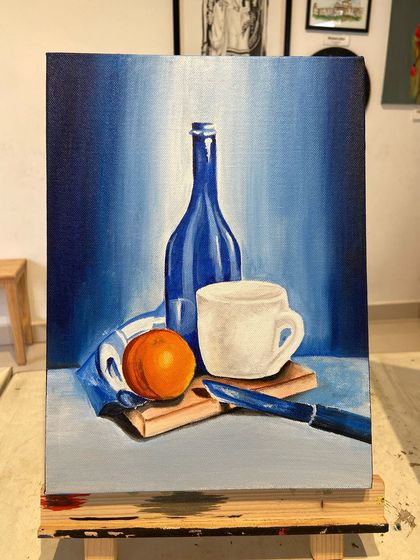 A student's acrylic still life painting, showcasing their understanding of light, shadow, and form on different objects.