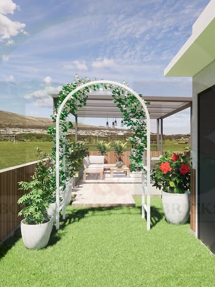 This 3D design shows a small green space on a rooftop, complete with an artificial lawn and a decorative arch. It's a great example of how we can introduce garden elements even in elevated, compact areas.