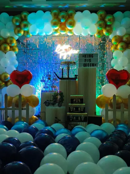 A moody, blue-lit shot of the "Better Together" anniversary setup. The custom lighting can completely change the feel of the room to match your event's theme.