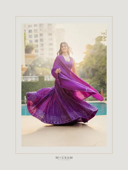 The Mehendi ceremony is a celebration of color, art, and joyful anticipation. I love capturing the bride in her element, like in this moment of pure happiness. The twirl of the lehenga, the golden sunlight, and her radiant smile all come together to create a frame that is full of life and energy.
