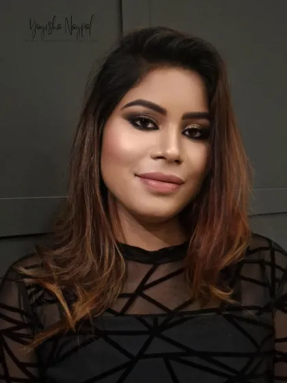 A breathtaking makeover. This look features dramatic smokey eyes and a perfectly contoured face, showing a complete transformation into a glam goddess.