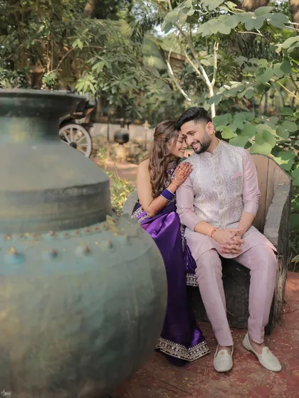 An intimate and sweet portrait of the couple. Devanshi whispering to Anshul creates a candid, personal moment that feels like we've captured a beautiful secret between them.