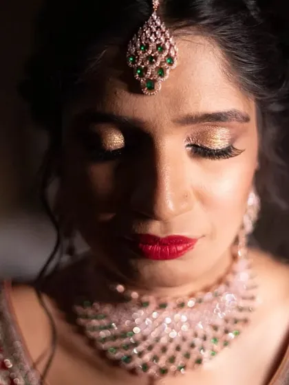 A close-up on the eye makeup for this Sangeet look. I used a beautiful gold shimmer on the lids, paired with a sharp wing and full lashes for a dramatic effect.