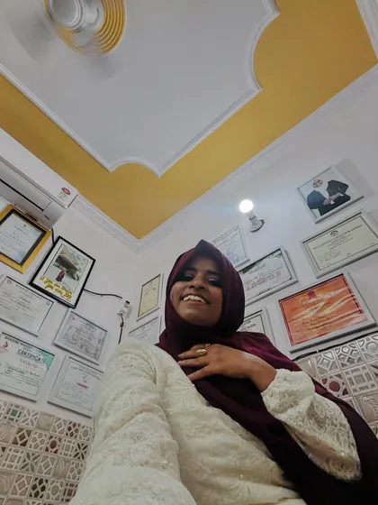 Another view of me in my studio, with my wall of fame. These certificates from various competitions and courses motivate me to keep learning and teaching.