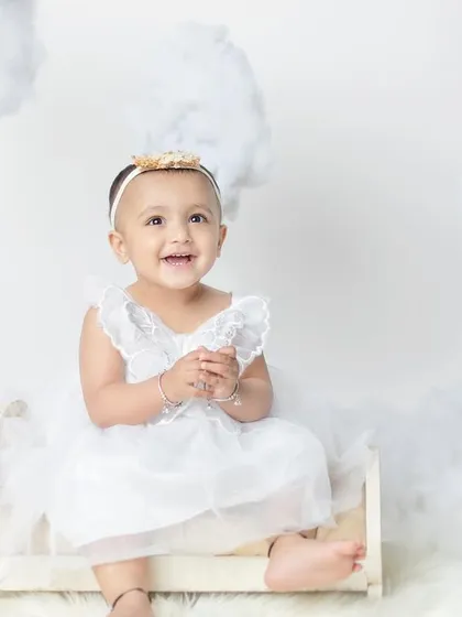 A little pari sitting on her tiny bed in the clouds. I have a variety of props to create different poses and scenes within one theme.