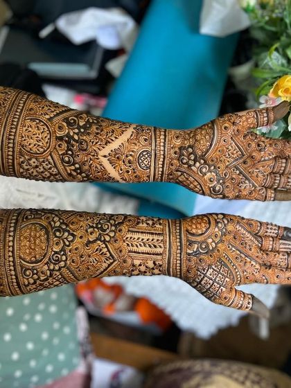 A horizontal view of both arms, showing the symmetry and flow of the bridal design.