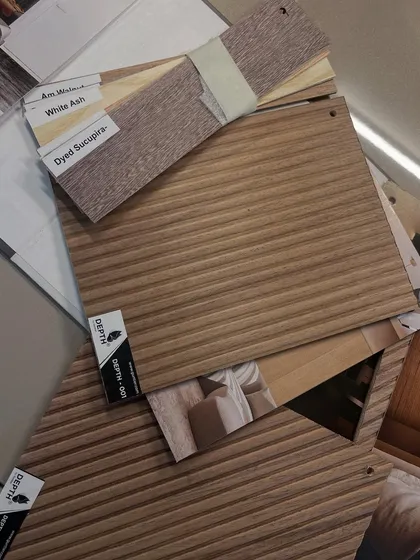 A collection of our 'Depth' textured veneer samples and other wood finishes, showcasing the variety we offer to bring your design vision to life.