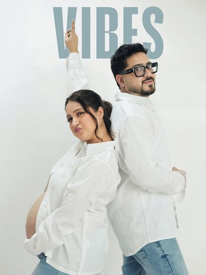 Capturing the 'Vibes' of the couple, this fun shot shows them striking a cool pose. It's a great example of how we can match the session's energy to your personality.