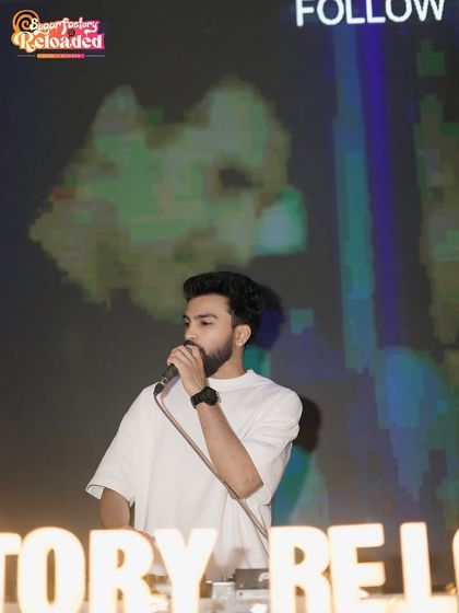 On the mic at Sugar Factory Reloaded, hyping up the crowd. Being an MC is a huge part of my style and how I keep the dance floor packed.