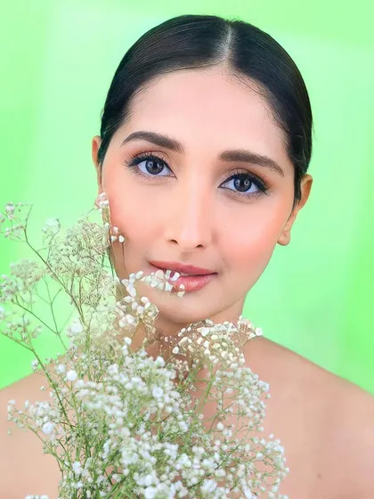 Class is timeless. This image from a creative shoot showcases a clean, nude makeup look that is all about enhancing natural beauty.