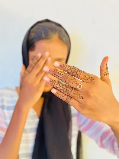 A close-up of detailed finger designs, a great option for a minimalist yet intricate look.